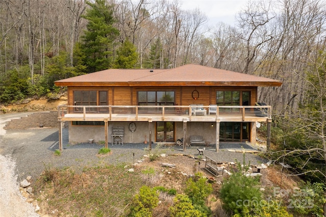 263 Mine Cove Rd, Spruce Pine, NC 28777 - back of house featuring a view of trees