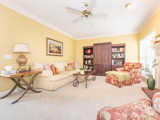 carpeted living area featuring ornamental molding and a ceiling fan