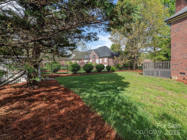 view of yard with fence