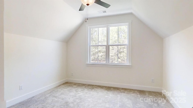 472 Bellingshire Dr, Mount Ulla, NC 28125 - bonus room with ceiling fan, light colored carpet, visible vents, lofted ceiling, and baseboards