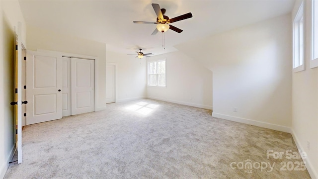 472 Bellingshire Dr, Mount Ulla, NC 28125 - unfurnished bedroom with baseboards, a ceiling fan, and carpet