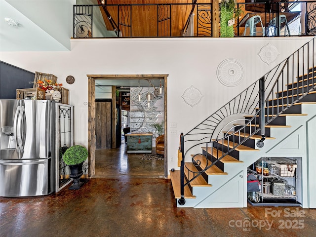 stairs with concrete floors