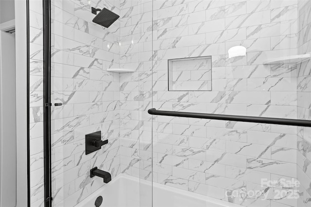 full bathroom with bath / shower combo with glass door