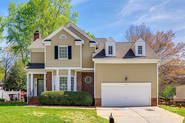 609 Tysons Forest Dr, Rock Hill, SC 29732 - traditional-style house with a shingled roof, driveway, a front lawn, and brick siding