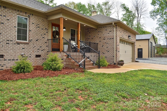 view of front of house featuring brick siding, concrete driveway, crawl space, an attached garage, and a front yard