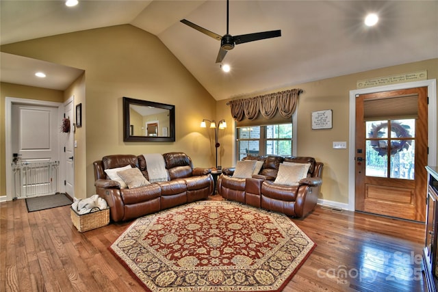 living area featuring a ceiling fan, wood finished floors, recessed lighting, high vaulted ceiling, and baseboards