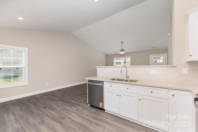 115 Frances St, Salisbury, NC 28147 - kitchen featuring dishwasher, ceiling fan, white cabinets, tasteful backsplash, and vaulted ceiling