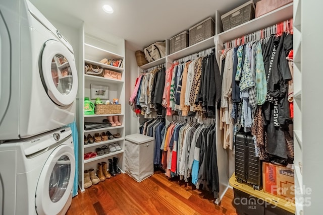 3510 Conway Ave, Charlotte, NC 28209 - washroom featuring stacked washing machine and dryer, wood finished floors, and recessed lighting