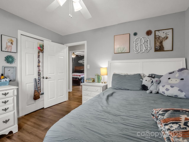 bedroom with wood finished floors and a ceiling fan