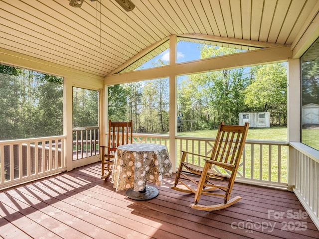 sunroom with a ceiling fan