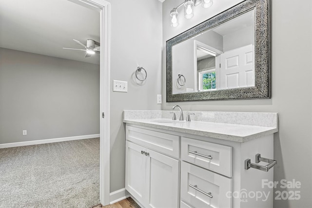 102 Kerda St, Taylorsville, NC 28681 - bathroom with baseboards, a ceiling fan, and vanity