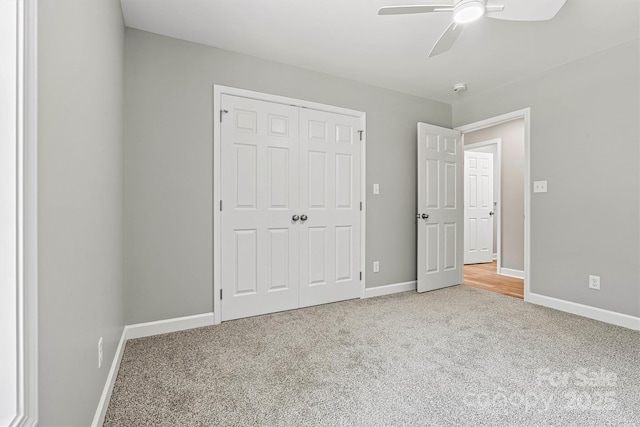 102 Kerda St, Taylorsville, NC 28681 - unfurnished bedroom with a closet, carpet flooring, baseboards, and a ceiling fan