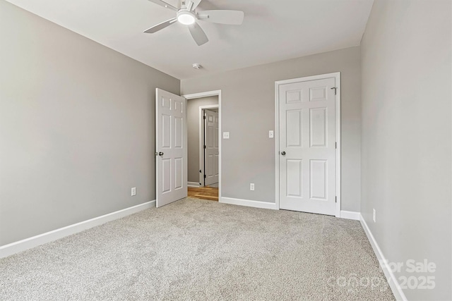 102 Kerda St, Taylorsville, NC 28681 - unfurnished bedroom featuring baseboards, a ceiling fan, and carpet flooring