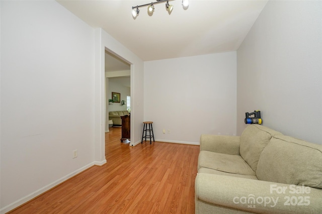 4133 Carl Parmer Dr, Harrisburg, NC 28075 - living area featuring baseboards and light wood finished floors