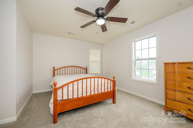4133 Carl Parmer Dr, Harrisburg, NC 28075 - carpeted bedroom with visible vents, baseboards, and a ceiling fan