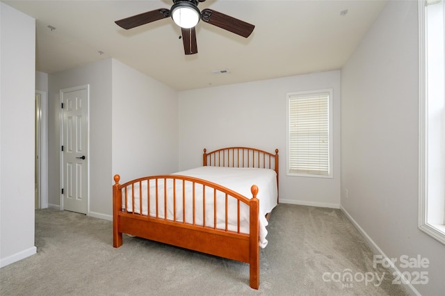 4133 Carl Parmer Dr, Harrisburg, NC 28075 - carpeted bedroom featuring visible vents, baseboards, and a ceiling fan