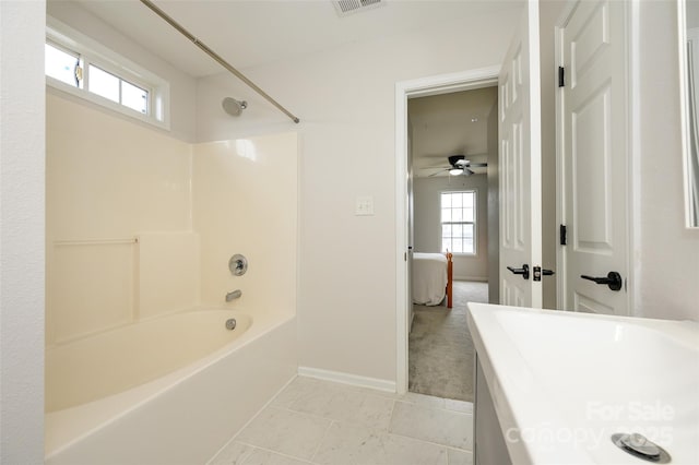 4133 Carl Parmer Dr, Harrisburg, NC 28075 - full bathroom with shower / bath combination, plenty of natural light, baseboards, and a ceiling fan