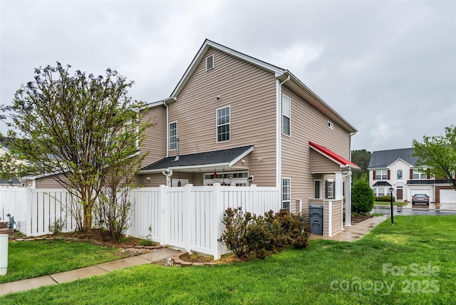 4133 Carl Parmer Dr, Harrisburg, NC 28075 - view of side of property with a yard and fence