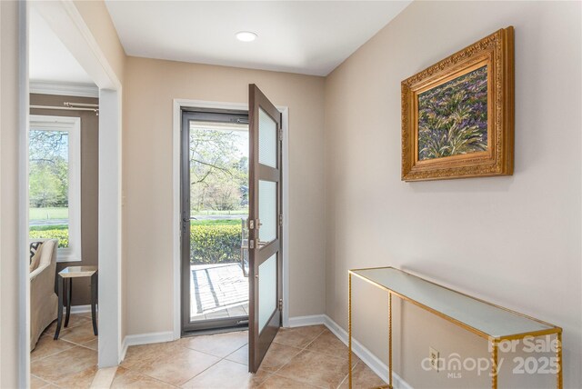 1329 Merrimon Ave, Asheville, NC 28804 - entrance foyer featuring light tile patterned floors and baseboards