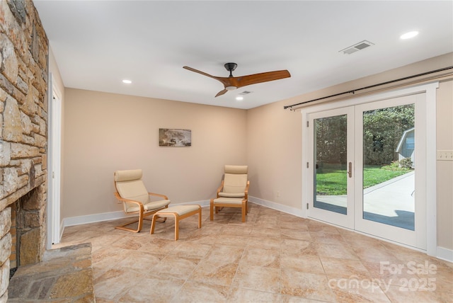 1329 Merrimon Ave, Asheville, NC 28804 - living area with french doors, baseboards, and a ceiling fan