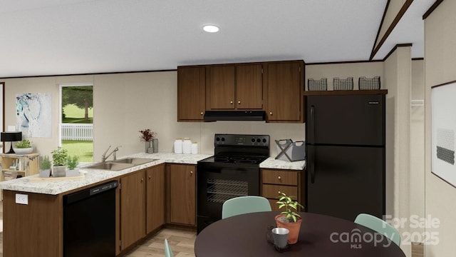 kitchen with light wood-type flooring, light countertops, black appliances, range hood, and a sink