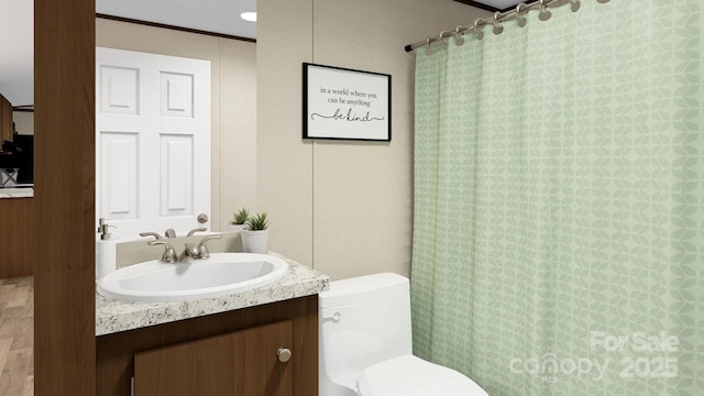 full bathroom with toilet, vanity, ornamental molding, and a shower with curtain