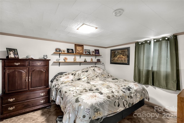 bedroom featuring crown molding