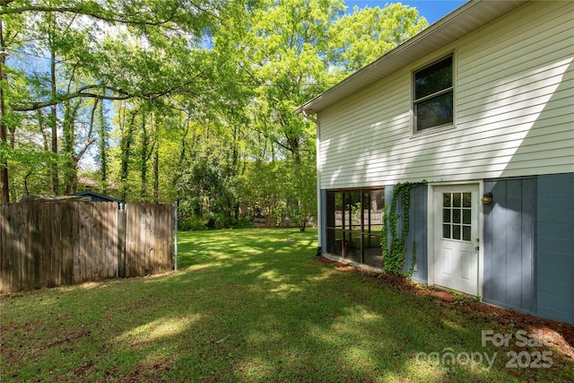 view of yard with fence