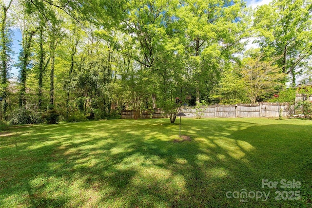 view of yard with fence