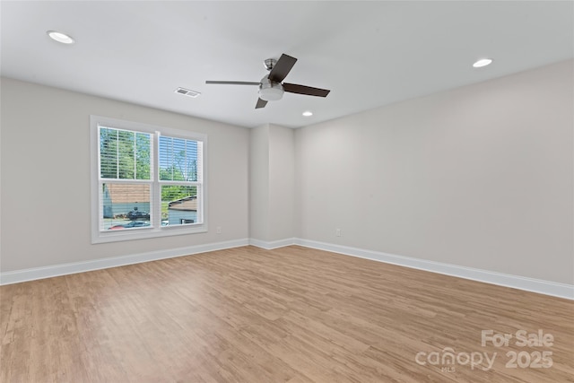 2032 Summey Ave, Charlotte, NC 28205 - empty room with wood finished floors, ceiling fan, baseboards, and recessed lighting