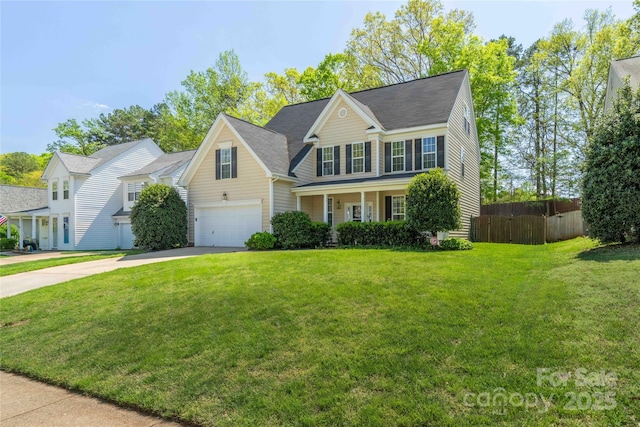 view of front of home featuring fence, concrete driveway, a front lawn, and a garage