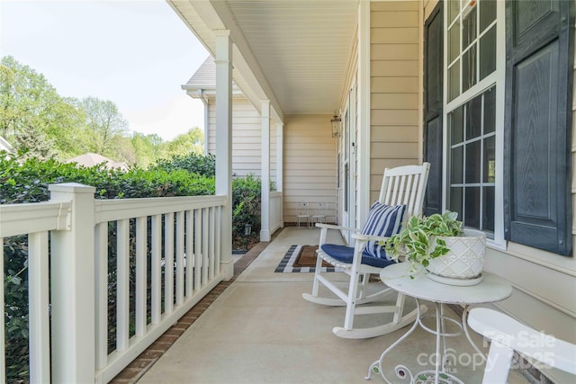 balcony featuring a porch