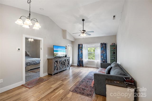 124 Foxden Dr Unit 303, Fletcher, NC 28732 - living area with wood finished floors, ceiling fan, a chandelier, baseboards, and high vaulted ceiling