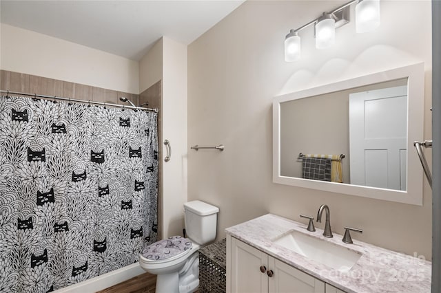 124 Foxden Dr Unit 303, Fletcher, NC 28732 - bathroom featuring toilet, vanity, a shower with shower curtain, and wood finished floors