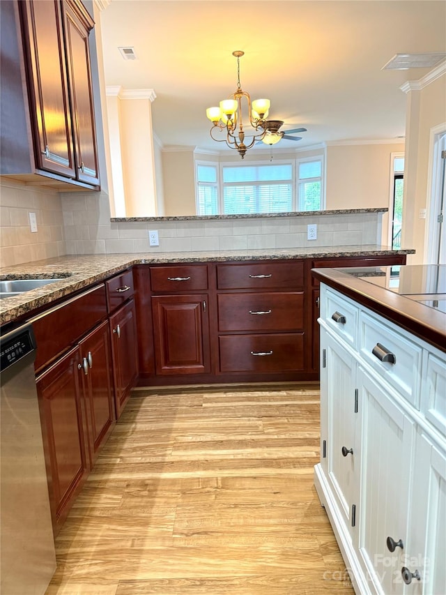 216 Harrison Ln Unit 4, Locust, NC 28097 - kitchen with an inviting chandelier, tasteful backsplash, crown molding, light wood-style flooring, and dishwasher