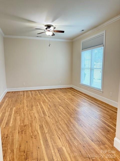 216 Harrison Ln Unit 4, Locust, NC 28097 - empty room with light wood-type flooring, ceiling fan, and crown molding