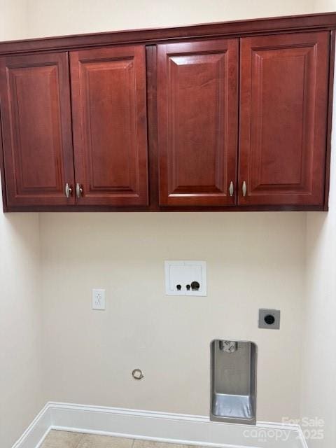 216 Harrison Ln Unit 4, Locust, NC 28097 - clothes washing area with cabinet space, electric dryer hookup, hookup for a washing machine, baseboards, and gas dryer hookup