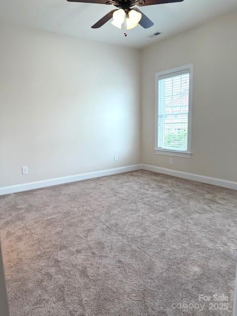 216 Harrison Ln Unit 4, Locust, NC 28097 - carpeted empty room with visible vents, a ceiling fan, and baseboards