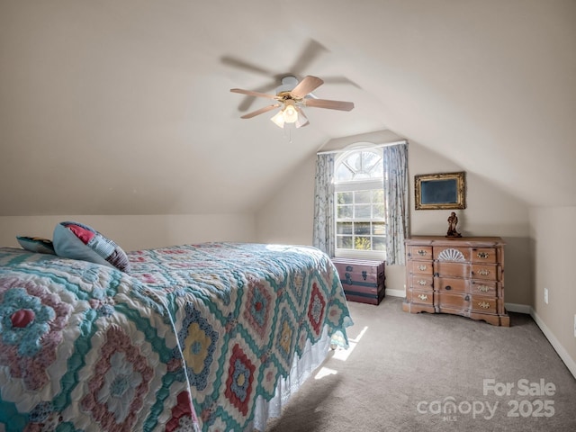 940 Hugh Champion Rd, Tryon, NC 28782 - carpeted bedroom featuring baseboards, ceiling fan, and vaulted ceiling