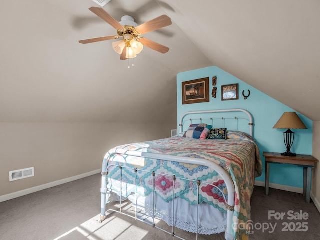 940 Hugh Champion Rd, Tryon, NC 28782 - carpeted bedroom featuring a ceiling fan, baseboards, lofted ceiling, and visible vents