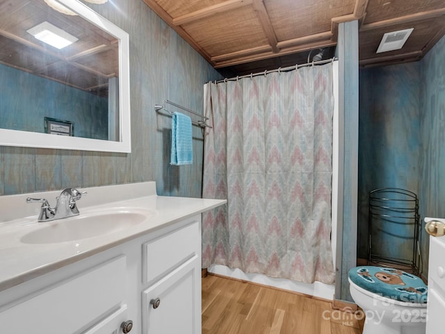 940 Hugh Champion Rd, Tryon, NC 28782 - full bath with vanity, a shower with curtain, visible vents, toilet, and wood finished floors