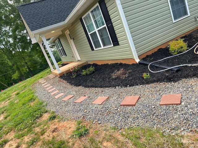 exterior space featuring covered porch