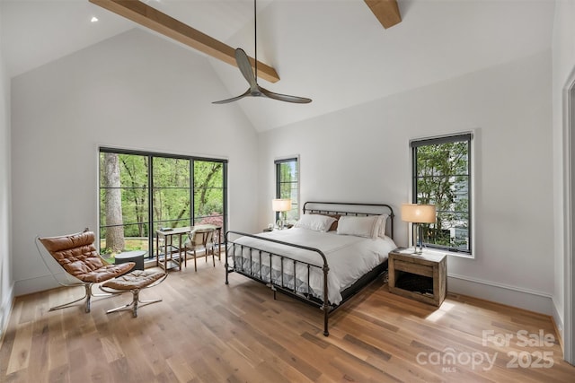 438 Wonderwood Dr, Charlotte, NC 28211 - bedroom featuring beam ceiling, baseboards, high vaulted ceiling, and wood finished floors