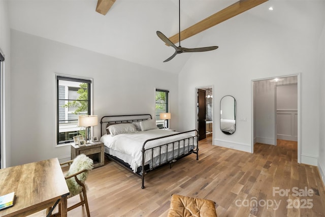 438 Wonderwood Dr, Charlotte, NC 28211 - bedroom featuring ceiling fan, beamed ceiling, high vaulted ceiling, wood finished floors, and baseboards