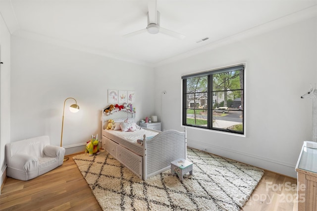 438 Wonderwood Dr, Charlotte, NC 28211 - bedroom with crown molding, visible vents, baseboards, and wood finished floors