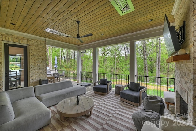 438 Wonderwood Dr, Charlotte, NC 28211 - sunroom with an outdoor living space with a fireplace, ceiling fan, wooden ceiling, and carpet floors