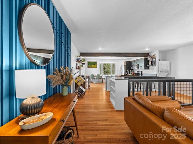 living room featuring recessed lighting and light wood-style floors