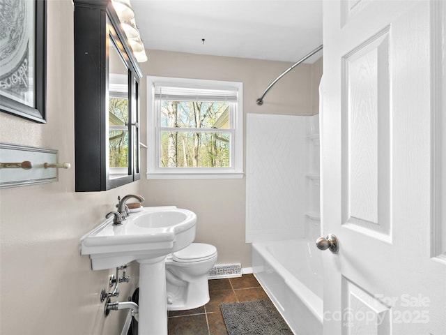 full bathroom featuring tile patterned floors, visible vents, bathtub / shower combination, and toilet