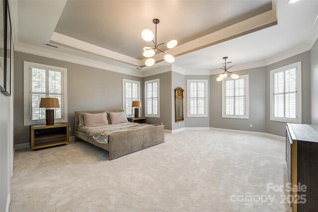 1126 Blowing Rock Cv, Fort Mill, SC 29708 - bedroom featuring a notable chandelier, baseboards, light carpet, crown molding, and a raised ceiling