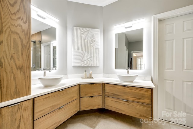 1126 Blowing Rock Cv, Fort Mill, SC 29708 - bathroom featuring walk in shower, tile patterned floors, double vanity, and a sink